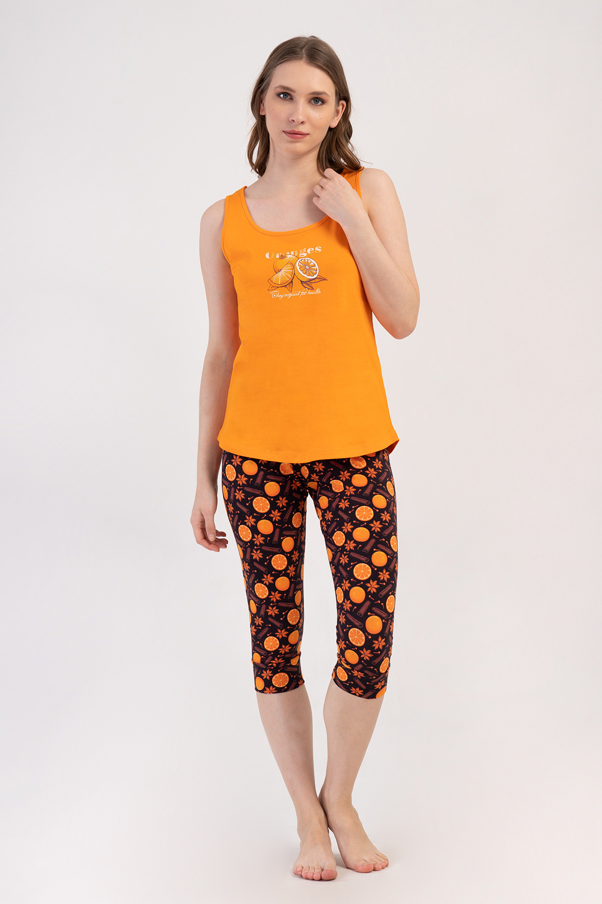 Woman Lycra Supreme Orangey Capri Set Woman Lycra Supreme Orangey Capri Set