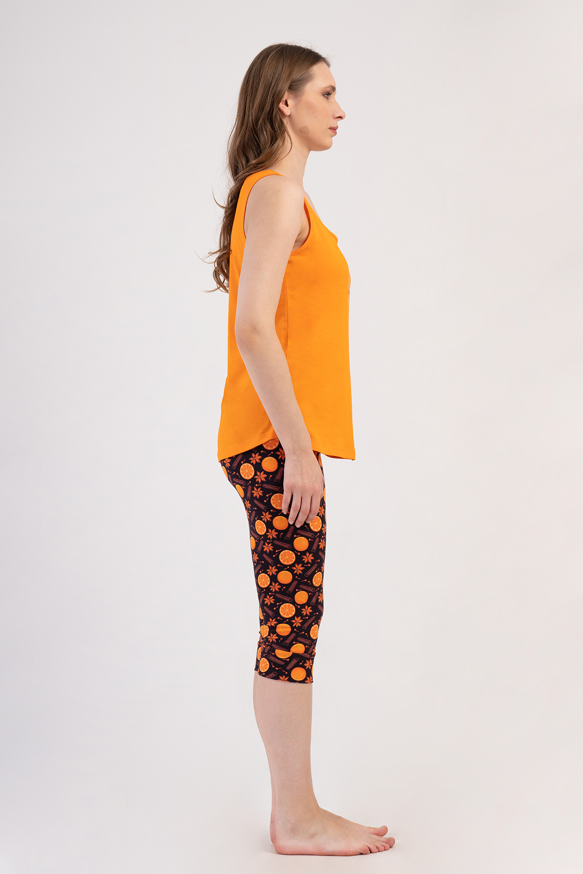 Woman Lycra Supreme Orangey Capri Set Woman Lycra Supreme Orangey Capri Set