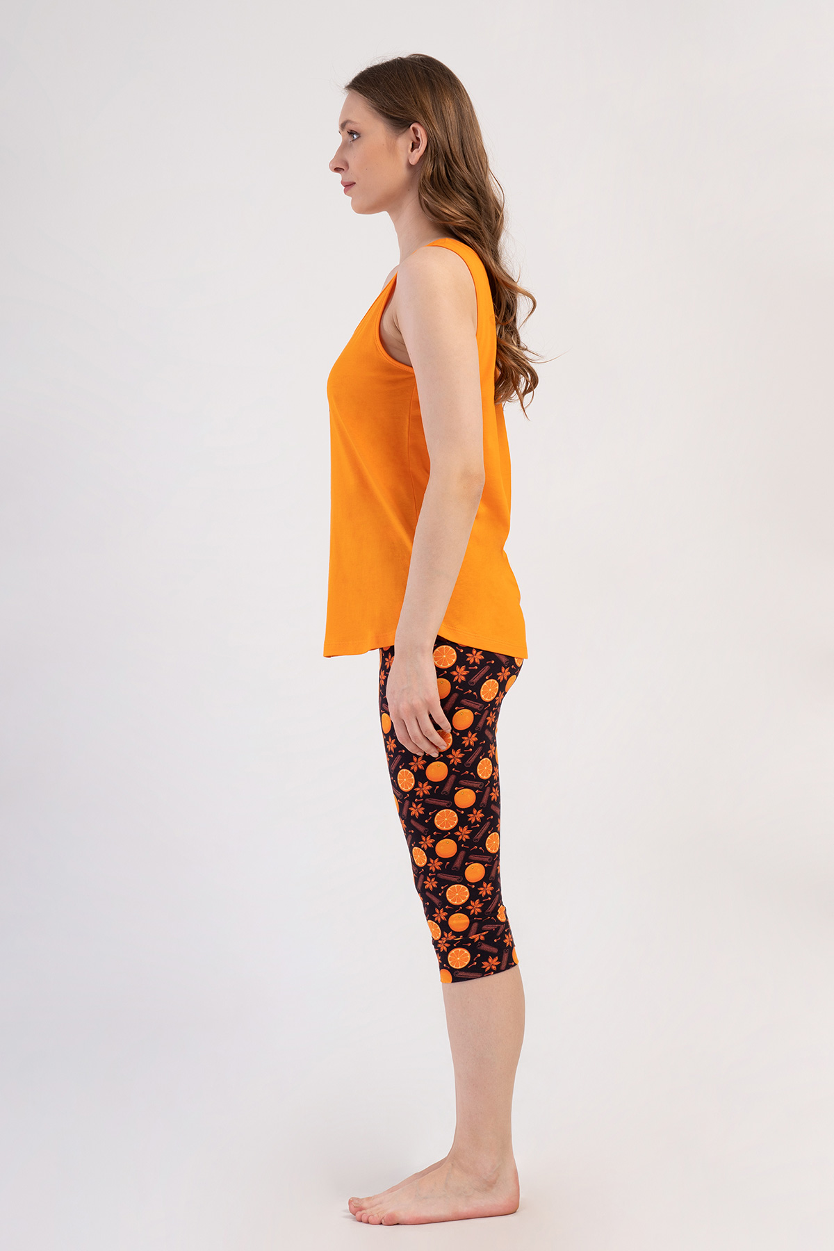 Woman Lycra Supreme Orangey Capri Set Woman Lycra Supreme Orangey Capri Set